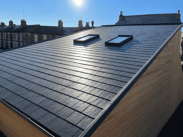 Roofer on pitched roof