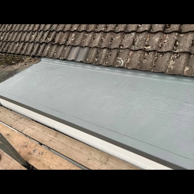 Roofer on pitched roof